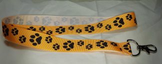 Djurtassar 10 Orange med svarta tassar