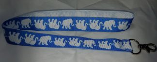 Elefanter vita på blått band