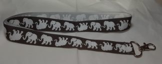 Elefanter vita på svart band