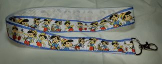 Pinoccio Tecknat Trä Pojke Blå Blått Vit Vitt Röd Rött Barn